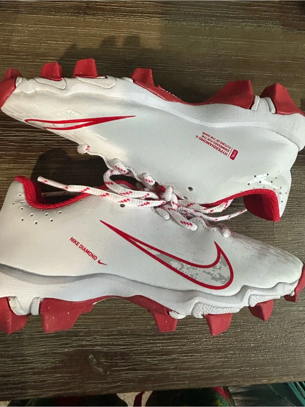 Nike Kids White cleats  with Red and Camo Accents